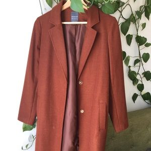 Coat in rust color